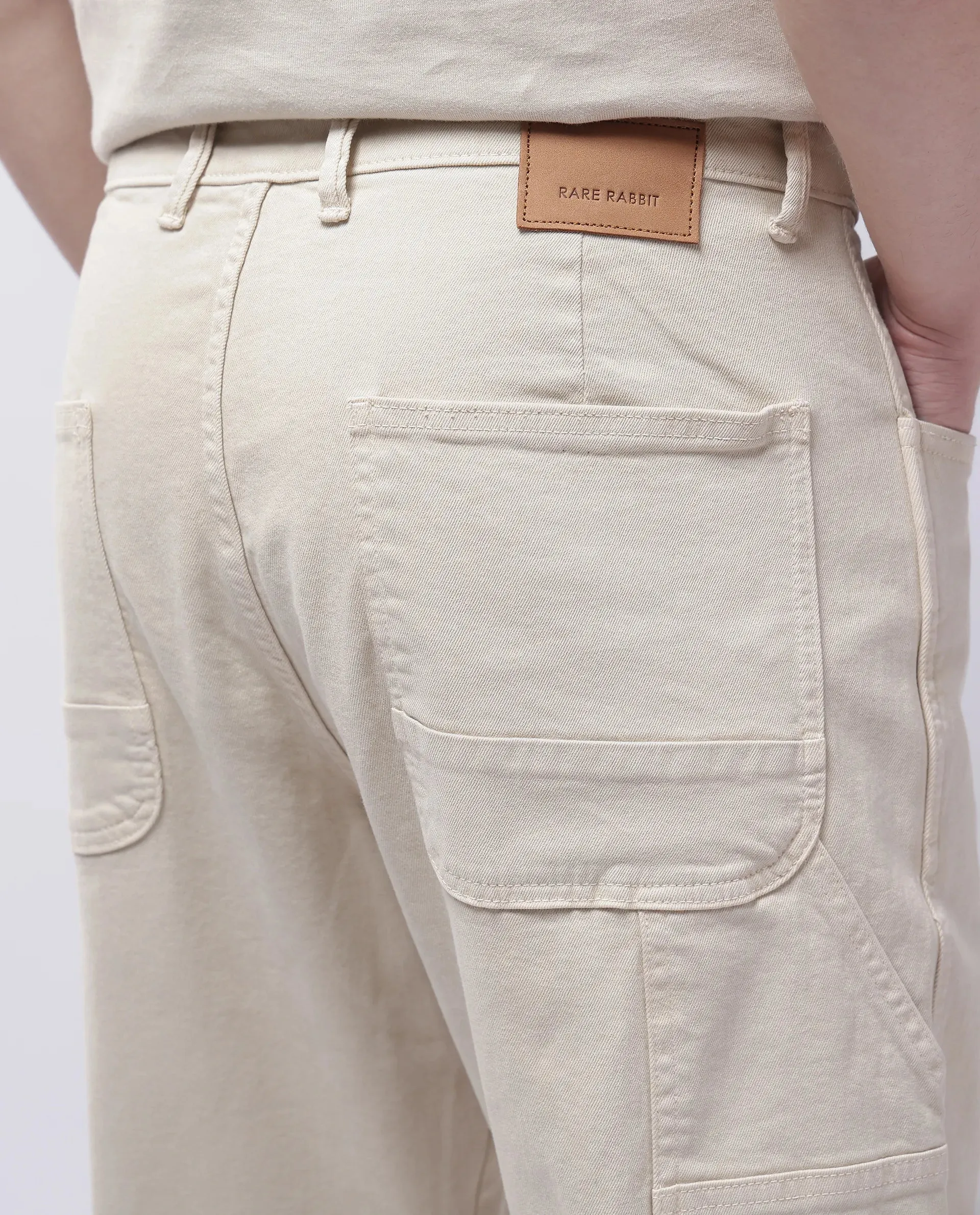 Rare Rabbit Men Arni Off White Cotton Viscose Garment Dyed Fabric Carpenter Fit Plain Denim Pant